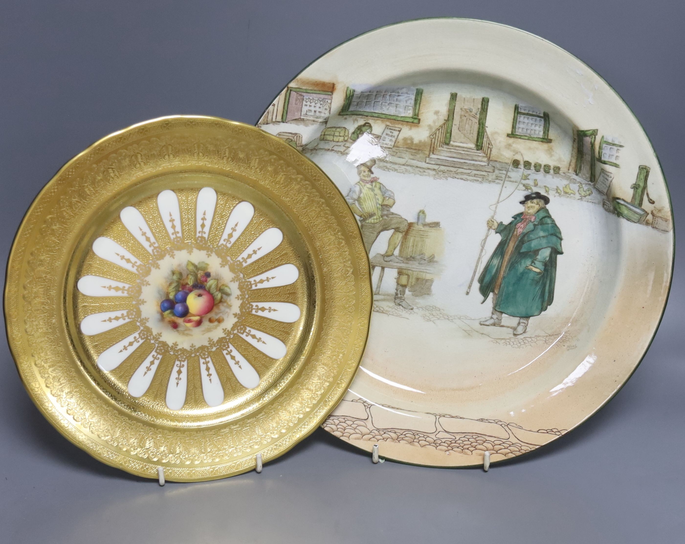 An Aynsley cabinet plate, painted with fruit, signed B.Jones, 26cm and a Royal Doulton Dickens ware dish, 32.5cm